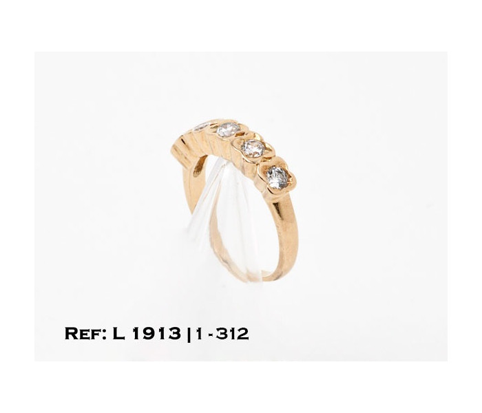 1-1-312-1-Anillo estilo cinquillo con piedras de circonita. Oro 18 kt.