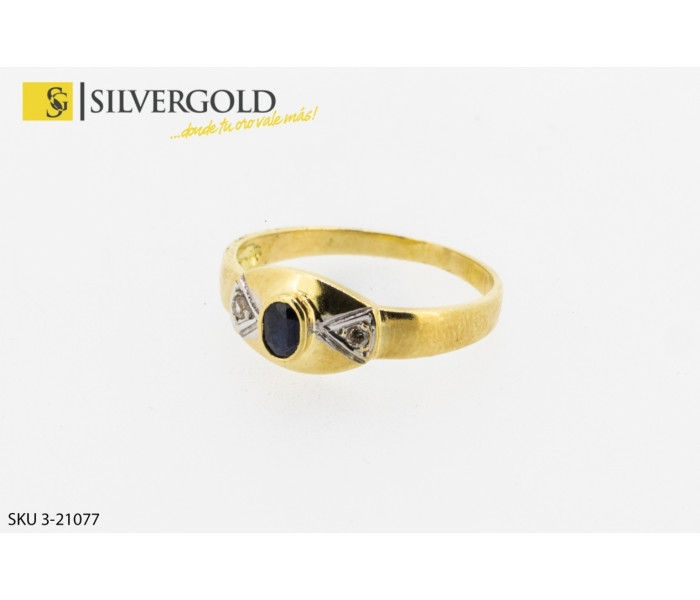 1-3-21077-1-Anillo con centro ovalado con piedras tipo circonitas y zafiro. Oro 18 kt.contraste 750m