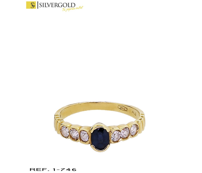 1-1-746-3-Anillo oro 18Kt. con piedra estilo zafiro y circonitas L2197